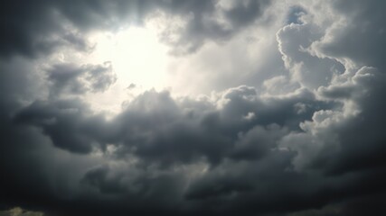 Fototapeta premium Dramatic Sunlit Cumulus Cloudscape with Dark and Light Tones