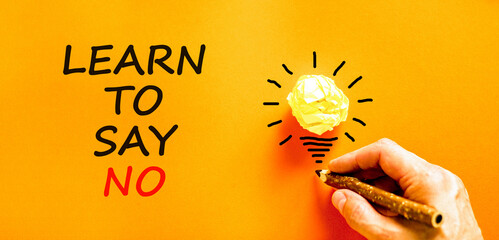 Learn to say no symbol. Concept words phrase Learn to say no on beautiful orange paper....