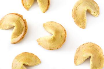 Fortune cookies opening on white background representing destiny and luck