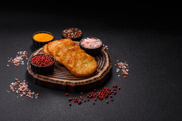 Potato hash browns, a meal with onions, cabbage in the form of fritters