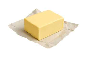 Fresh block of butter on unwrapped parchment paper, isolated on transparent background. Perfect for culinary, baking, and dairy product concepts.