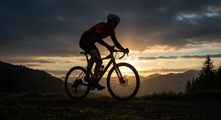 Obraz premium Silhouette of Cyclist Riding Gravel Bike at Sunset Adventure and Freedom Mountain Biking Scenic Outdoors Lifestyle Cycling