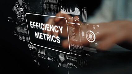 Hands Interacting with Digital Interface Displaying Efficiency Metrics and Data Visualization...