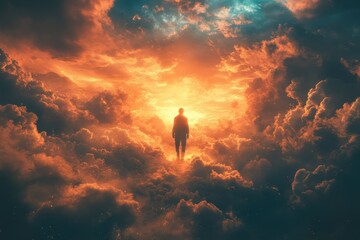 Person standing among vibrant clouds at sunset with warm orange and blue hues filling the sky