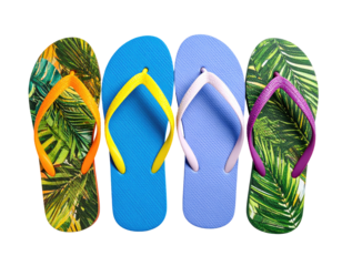 Four colorful flip-flops arranged against a transparent black background featuring tropical leaf patterns and solid color straps