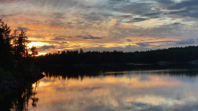 Breathtaking view of sunset over the tranquil waters of Temagami, Ontario