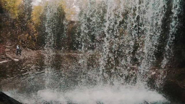 Breathtaking slow-motion shot taken behind Bridal Veil Falls on Manitoulin Island.