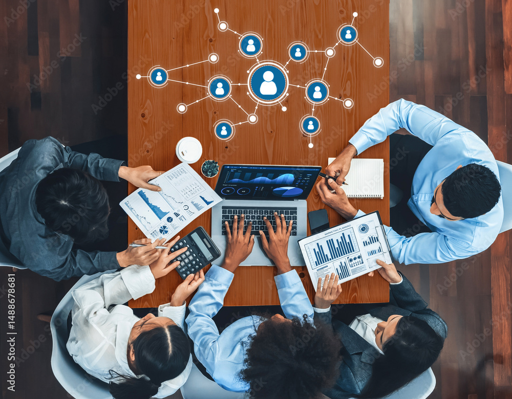 Poster a top-down view of a diverse business team collaborating in a modern office, engaging in a data anal