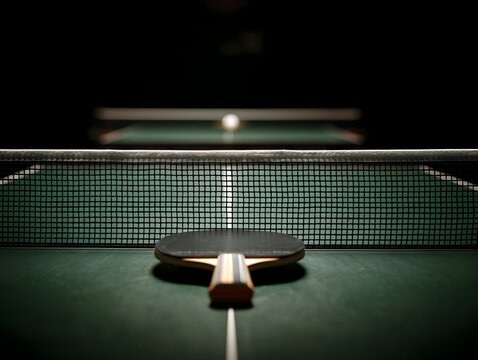 Table tennis net taut and paddle with spin-enhancing rubber poised for competitive fast-paced match intensity