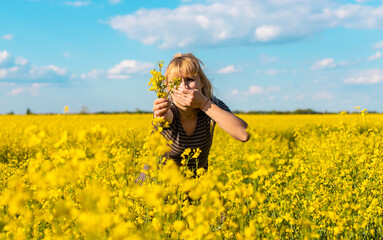 Yellow field flowers allergy. Selective focus.