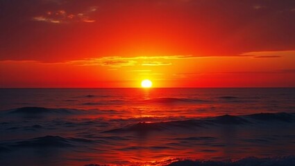 Obraz premium Vibrant Sunset Over a Tranquil Ocean With Rippling Waves on a Calm Evening in a Coastal Paradise