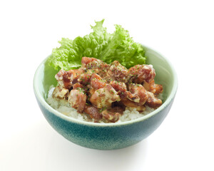 Isolated Delicious Bowl of Seasoned Fried Chicken and Buttermilk Sauce and Rice Topped With Fresh Lettuce and Herbs, Perfect for a Quick Meal