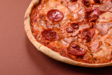 Italian pepperoni pizza with cheese and salami, tomatoes and sauce
