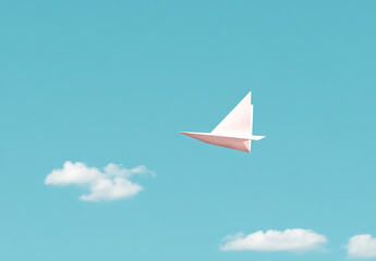Fototapeta premium Paper Airplane Soaring: A pastel pink paper airplane glides through a bright blue sky dotted with fluffy white clouds, embodying dreams of flight and freedom.