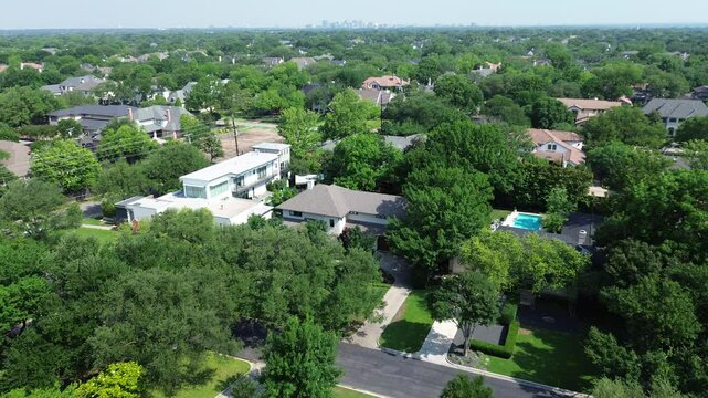 Vacant lot for newer home being built on established areas with existing mansion houses, affluent Preston Hollow neighborhood outside Dallas metroplex, luxury amenities, mature landscaping, Texas