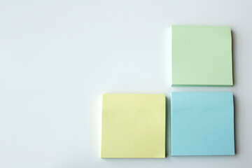 Sticky notes in three pastel colors. Stationery post for office, school, home and self reminder....