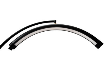 Curved LED lamp arm with modern black design, close-up on white back