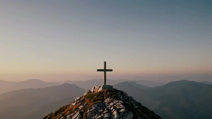 A solitary cross on a mountain peak at sunrise, symbolizing faith and solitude. - Powered by Adobe