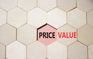 Price and Value symbol. Concept word Price and Value on wooden comb puzzle. Beautiful pink...