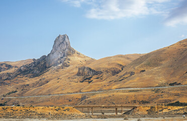 Azerbaijan mountain landscape and train track in the foreground