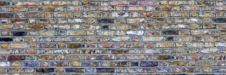 Rustic Multicolored Brick Wall Texture with Weathered Vintage Appeal, banner, panorama