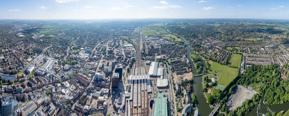 Epic panoramic aerial view of Reading center and railway station, modern city, Berkshire, United Kingdom