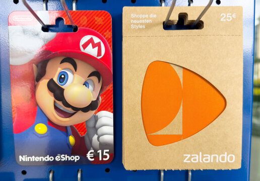 Nintendo eshop and zalando gift cards displayed on retail shelf