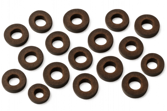 Brown wooden rings of varying sizes arranged in a bunch, isolated on transparent background. - Powered by Adobe
