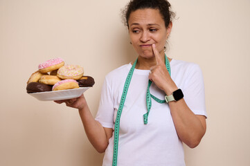 Woman Debating Between Sweet Doughnuts and Healthy Choices Featuring Wellness Awareness
