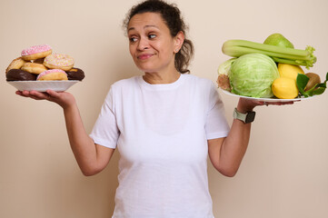 Balanced Choices: Woman Weighing Plates of Doughnuts and Fresh Vegetables