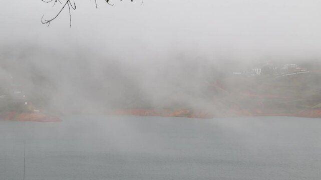 time lapse of fog on the lake calima colombia