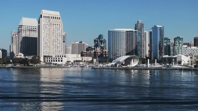 Aerial Shot Of The Rady Shell In Modern City, Drone Ascending Forward Over Sea On Sunny Day - San Diego, California