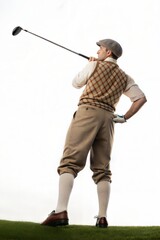 Rear view of golfer in retro outfit preparing for a shot against white background