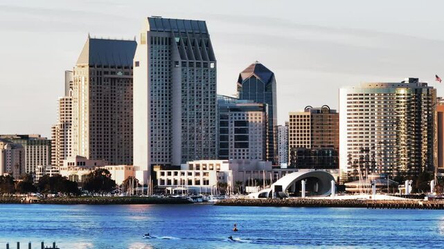 Aerial: Drone Panning Shot Of The Rady Shell By Modern Buildings In City - San Diego, California