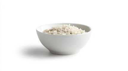 Simple bowl of fluffy white rice sits isolated against stark white background