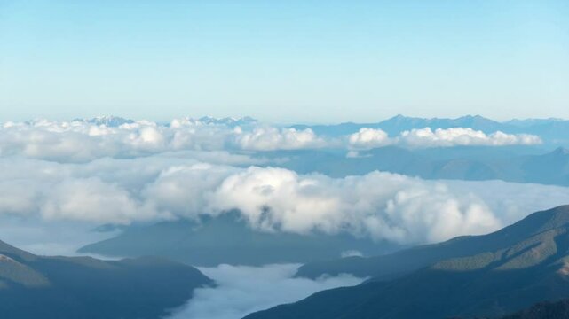 Aerial view of beautiful mountain landscape. Clouds hover over the mountains