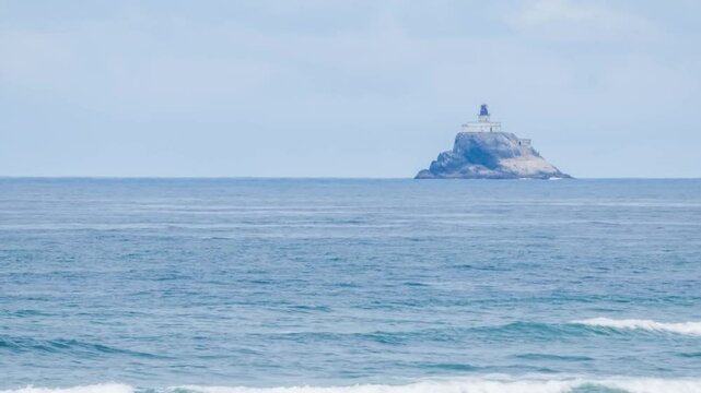 Tillamook Rock Lighthouse Offshore from Oregon Coast Near Tillamook Head, Known as Terrible Tilly &ndash; 4K Drone View