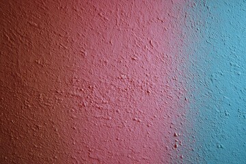 Obraz premium Reddish-Pink and Teal-Blue Textured Wall Surface
