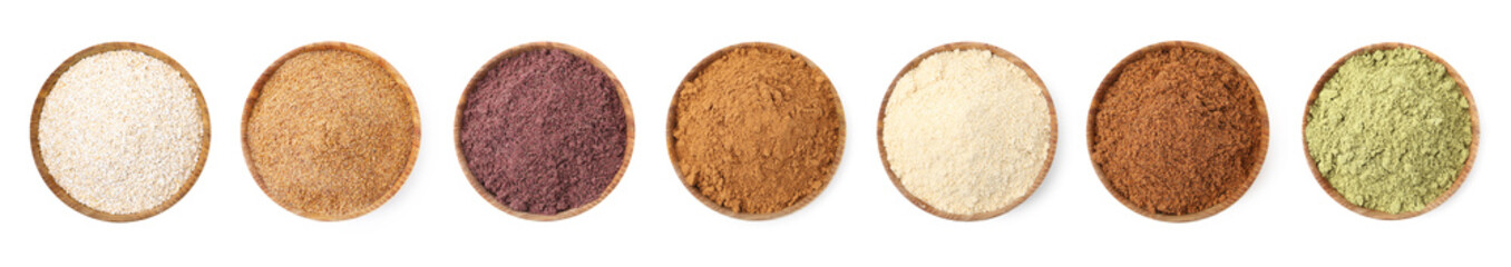 Different superfood powders in bowls on white background, set. Top view