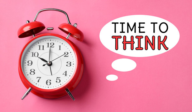 Alarm clock and speech bubble with words Time To Think on pink background. Banner design