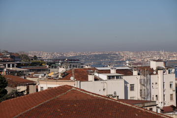 Istanbul rooftops cityscape panorama: Bosphorus view, daytime, showcasing urban architecture.