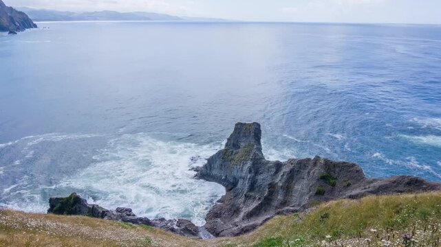4K footage of Cape Falcon, a rugged cape along Oregon&rsquo;s coast in Oswald West State Park. It features dense forest, cliffs, and ocean waves below.