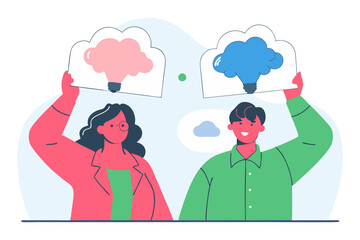 Obraz premium A man and a woman hold up thought bubble lightbulbs, symbolizing shared ideas or empathy.