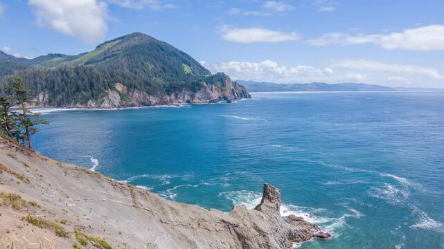 4K footage of Cape Falcon Trailhead, Oswald West State Park, Oregon. Shows forested trail with views of the Pacific Ocean and Cape Falcon Marine Reserve.