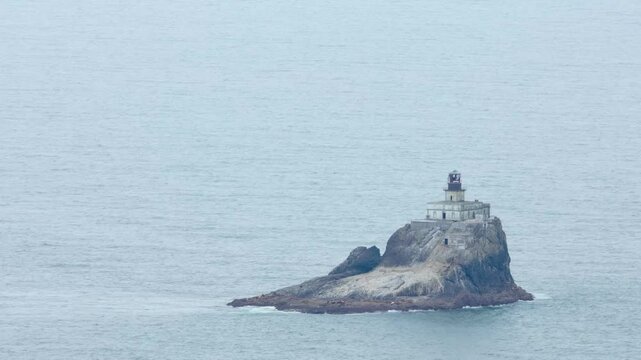 The footage shows Terrible Tilly, Oregon's isolated Tillamook Rock Lighthouse, known for enduring storms and standing firm on a coastal basalt island.