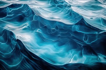 Obraz premium Close-up view of translucent blue ice formations creating intricate layered patterns and smooth flowing textures evoking calm and coolness