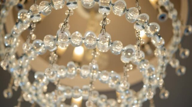 Abstract close-up of crystal chandelier with blurred light reflections