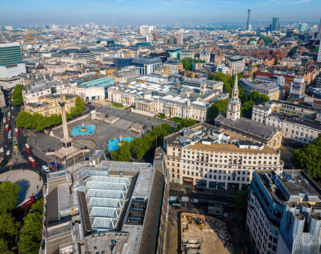 Aerial view of Trafalgar Square in London with fountains, Nelson&rsquo;s Column, and surrounding historic and modern architecture