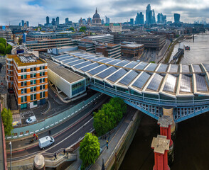 Aerial view of Blackfriars station with solar panels on the roof, London skyline and St. Paul’s Cathedral in the background
