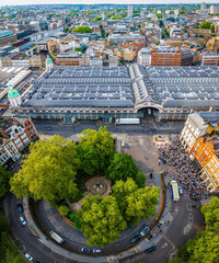 Aerial view of Smithfield Market in London, featuring historic architecture, city streets, and surrounding modern urban buildings